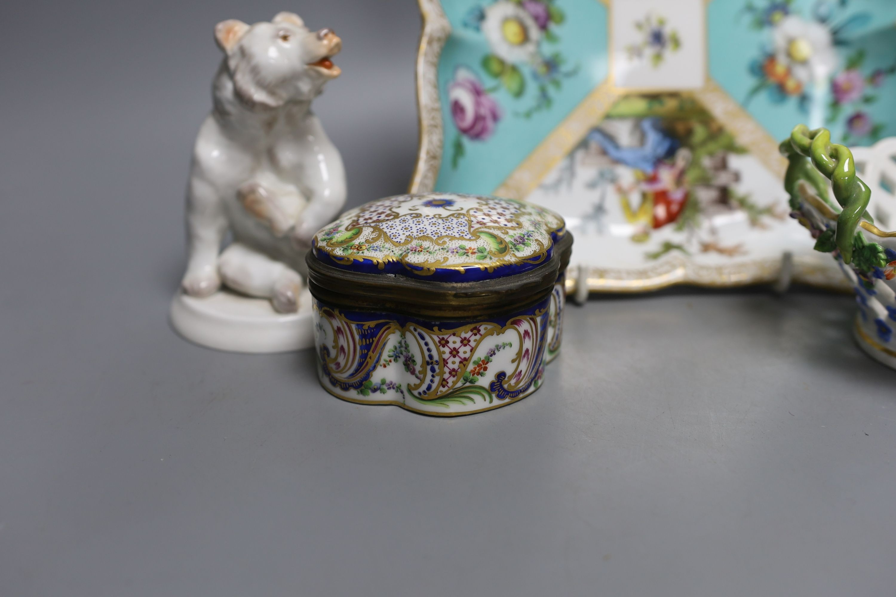 A moden Meissen figure of a bear, 11cm tall, together with a painted porcelain trinket box and two Meissen dishes (4)